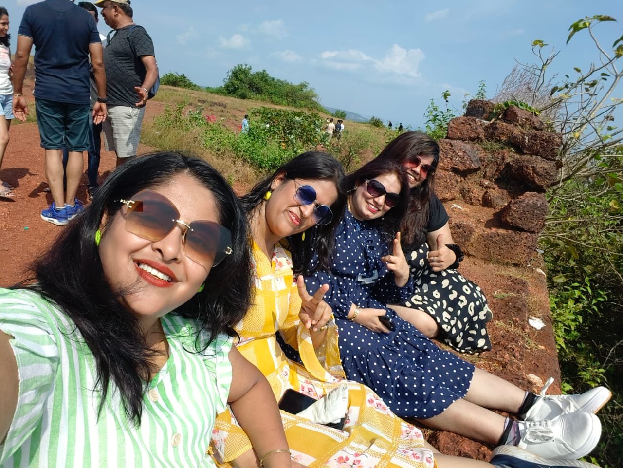 Friends taking a scenic outdoor selfie
