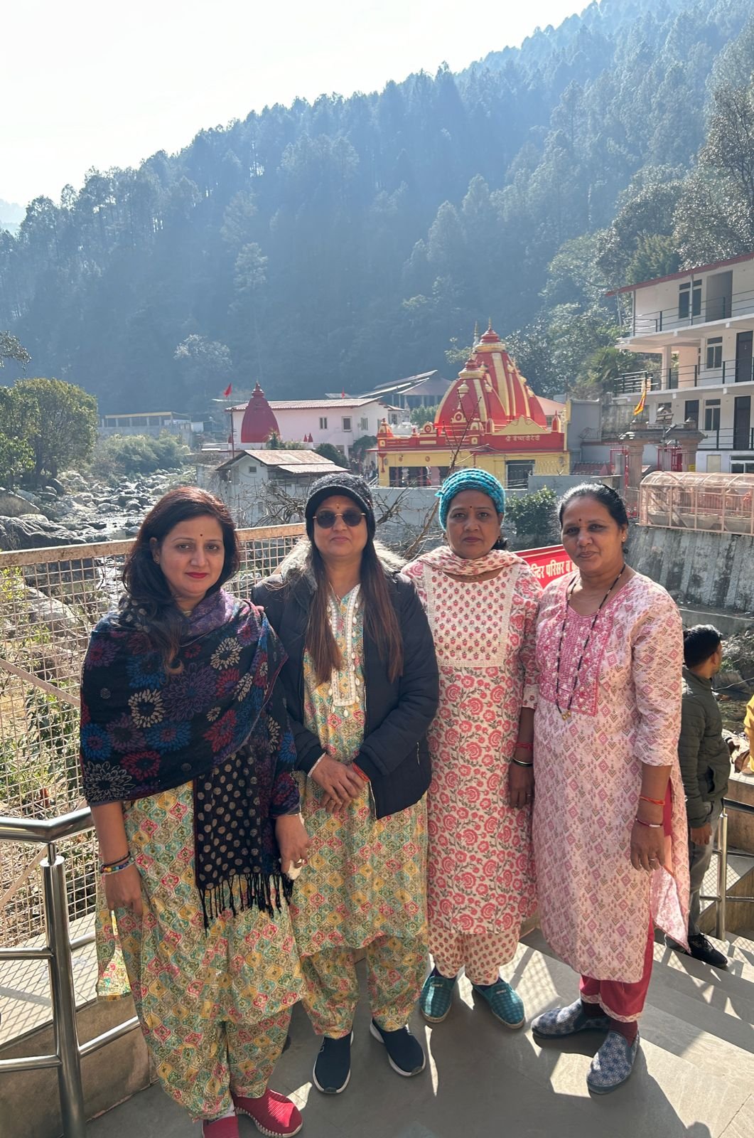 Travelers at a hill temple destination